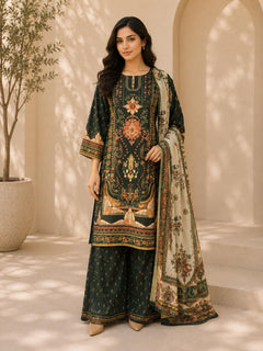 Woman wearing a dark green printed kameez with matching wide leg trousers and a patterned dupatta